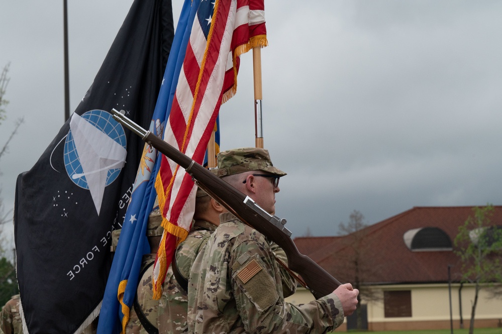 First all Space Force flight member carries guidon, OTS graduation