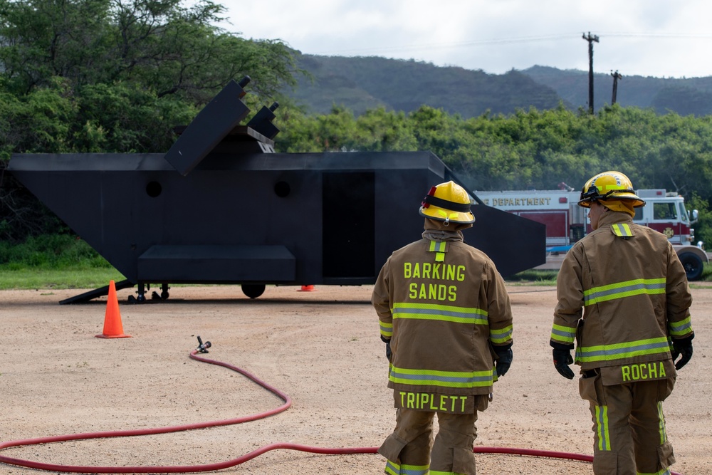 Pacific Missile Range Facility (PMRF) Barking Sands Fire and Emergency Services conduct first drill with the V22 Ospery Live Fire Training System.