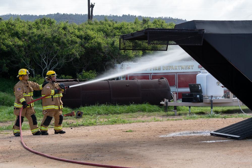 Pacific Missile Range Facility (PMRF) Barking Sands Fire and Emergency Services conduct first drill with the V22 Ospery Live Fire Training System.