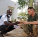 U.S. Army National Guard Medic Speaks With a Patient Family Member