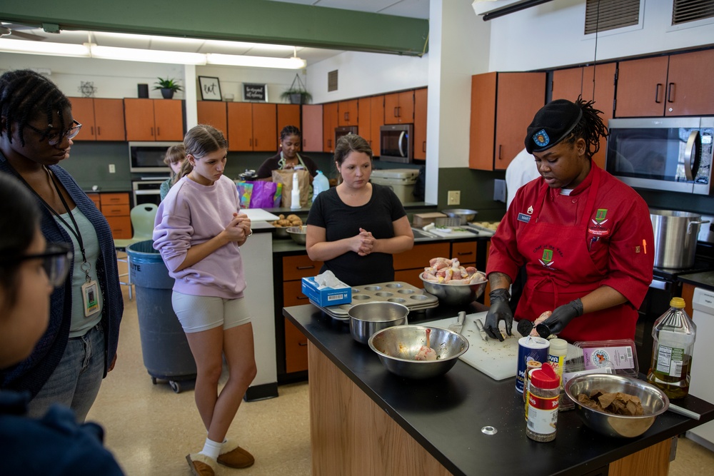 More Than Food: 1st Infantry Division Culinary Specialists Cook For Springfield High School Students