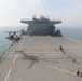 U.S. Army aviators conduct Deck Landing Qualification on USS Lewis B. Puller