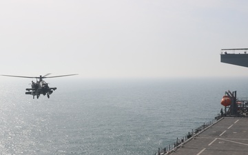 U.S. Army aviators conduct Deck Landing Qualification on USS Lewis B. Puller