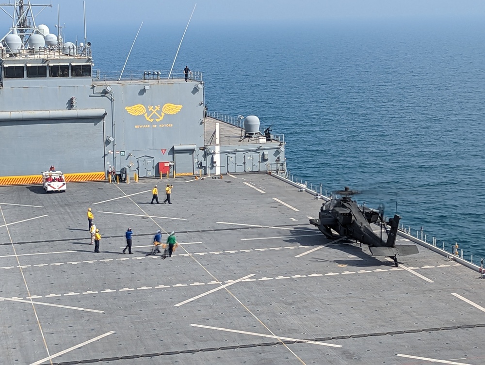 U.S. Army aviators conduct Deck Landing Qualification on USS Lewis B. Puller
