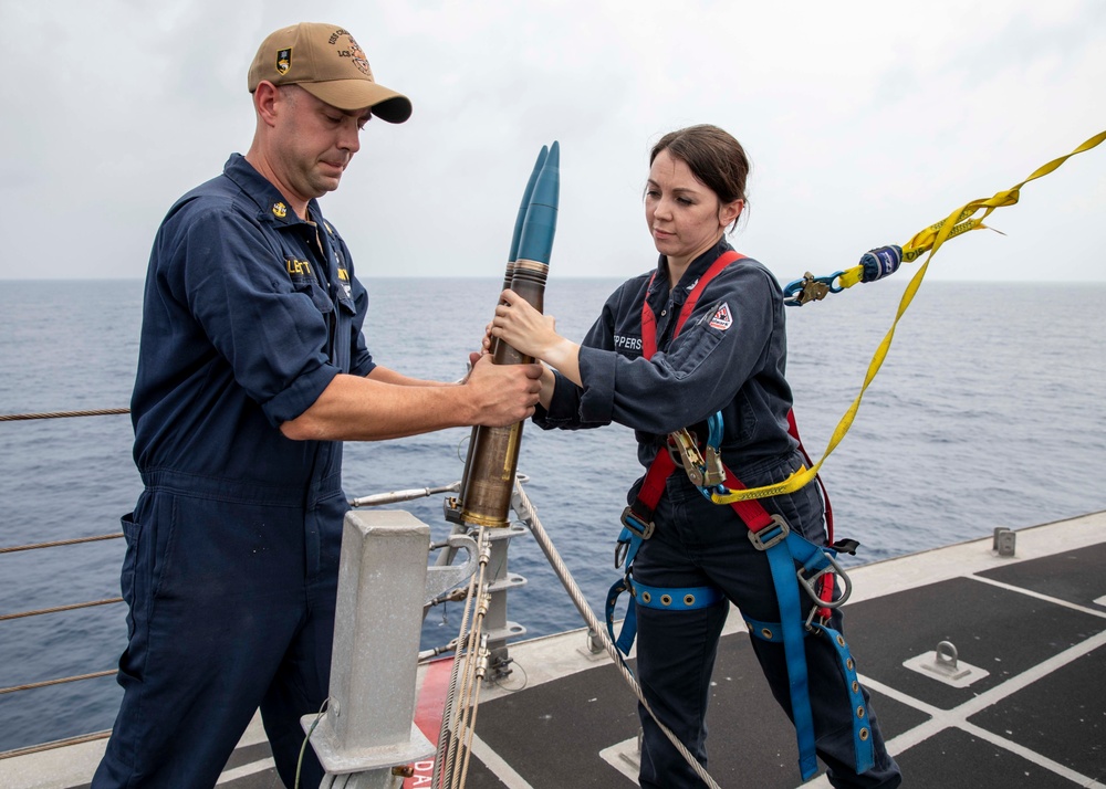 USS Charleston conducts ammunition transfer and electrical maintenance in the Bay of Bengal