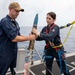 USS Charleston conducts ammunition transfer and electrical maintenance in the Bay of Bengal