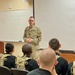 National Guard Liaison Noncommissioned Officer, Sgt. 1st Class Lucas Hendricks provides an introductory brief to new Army National Guard Trainees