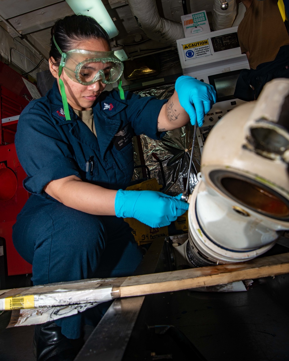 Sailor Disassembles Drag Brace Assembly