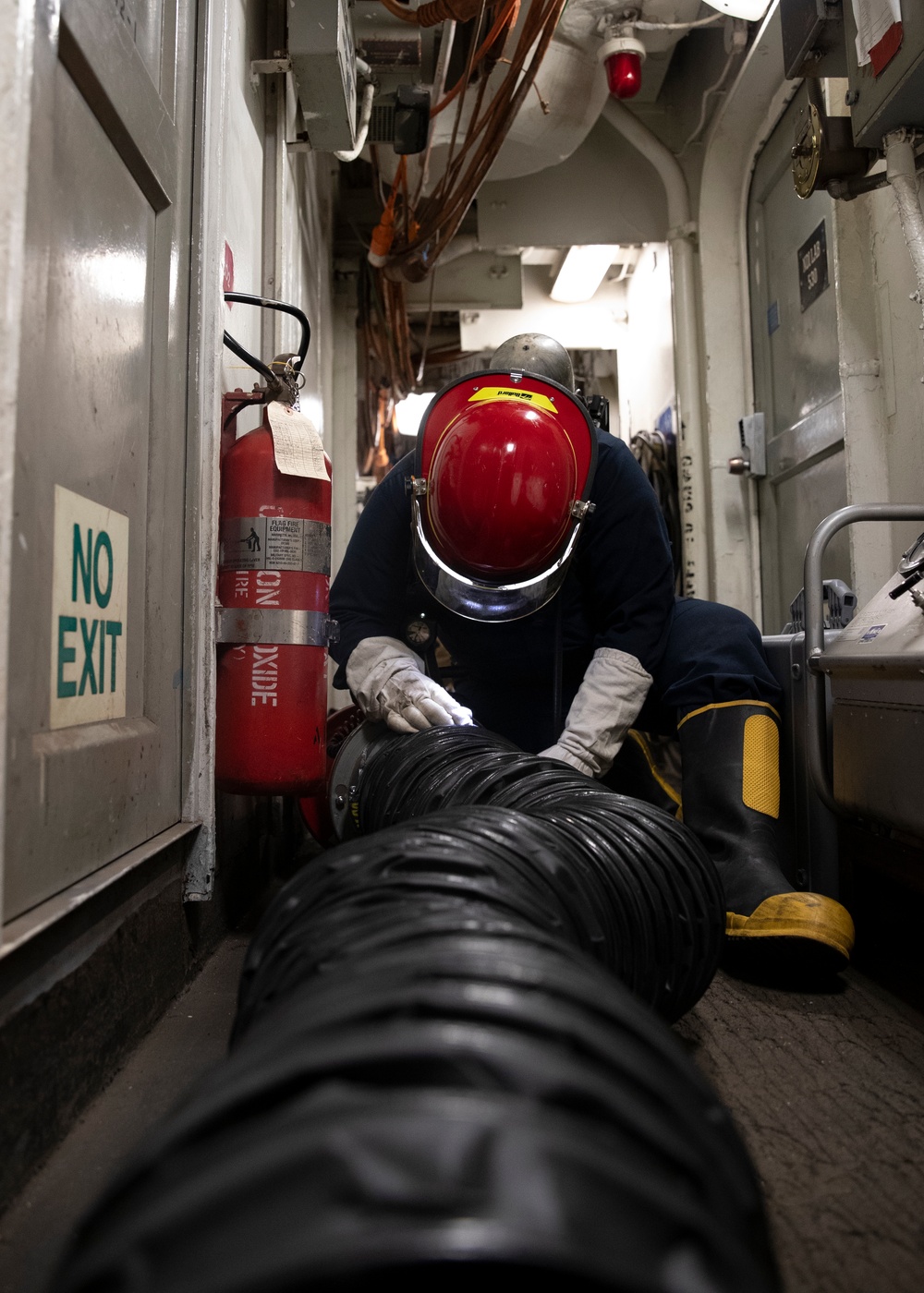 Train to Fight: George Washington Sailors run Damage Control Drill