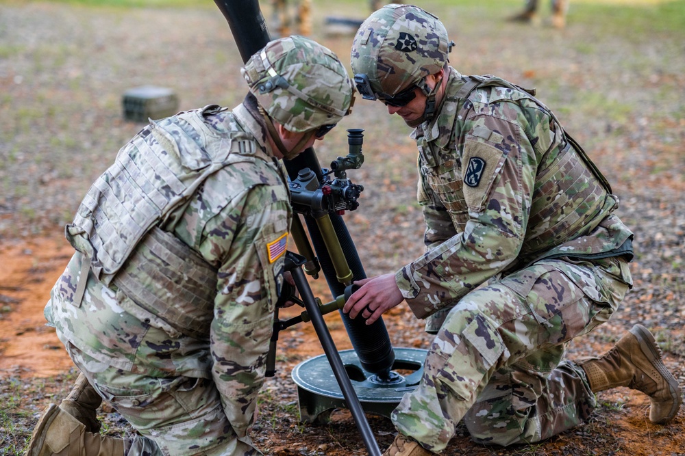 Soldiers deploy a mortar system
