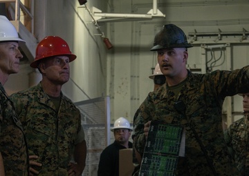 3rd Marine Aircraft Wing Marines load aviation support equipment onto the SS Curtiss