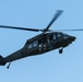 Army reserve conduct rappel training onboard a UH-60 Blackhawk