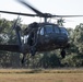 Army reserve conduct rappel training onboard a UH-60 Blackhawk