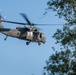 Army reserve conduct rappel training onboard a UH-60 Blackhawk