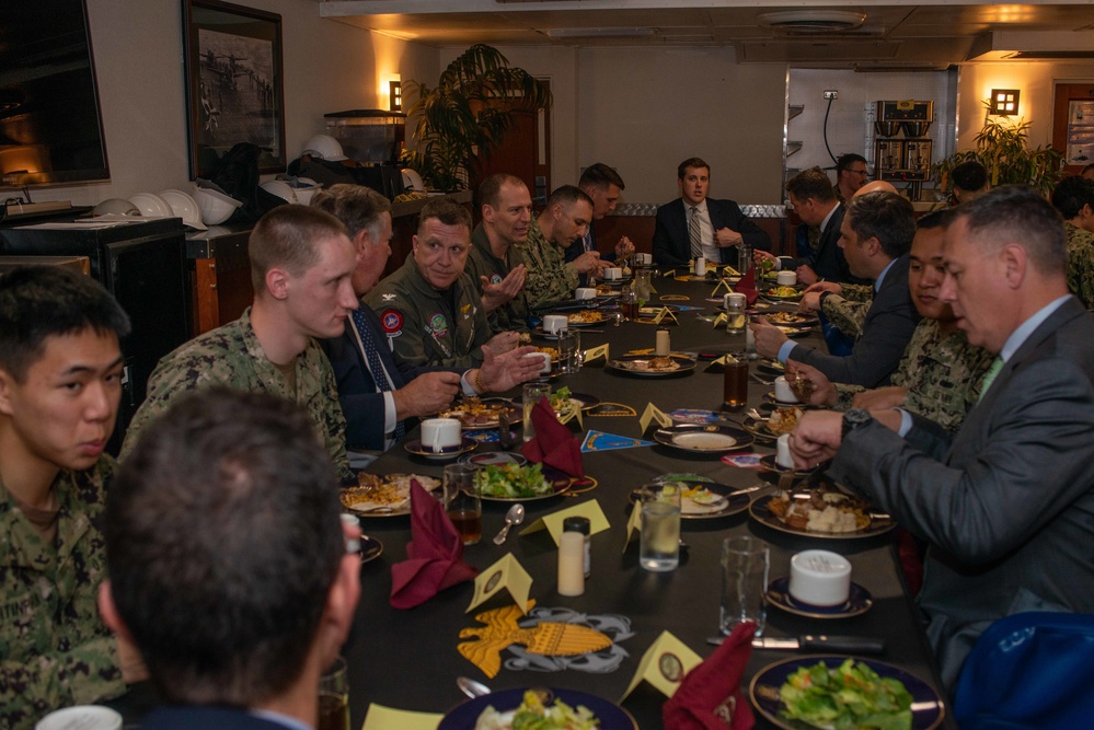 USS Ronald Reagan (CVN 76) Sailors have lunch with Members of the House Appropriations Committee Defense Subcommittee