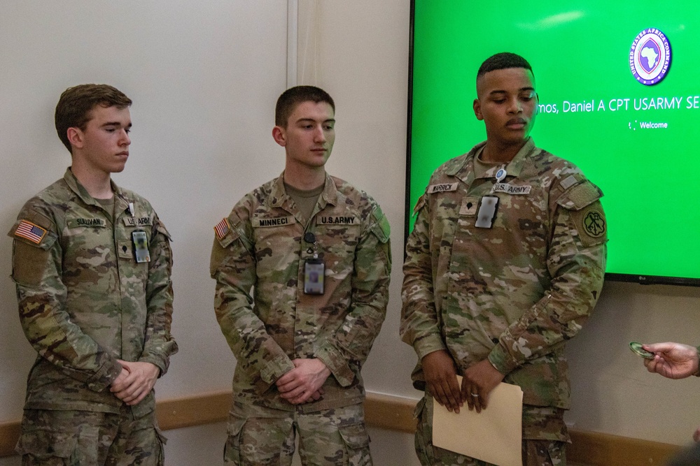 SETAF-AF intelligence analysts receive coin from Michigan National Guard