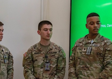SETAF-AF intelligence analysts receive coin from Michigan National Guard