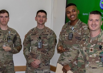 SETAF-AF intelligence analysts receive coins from Michigan National Guard