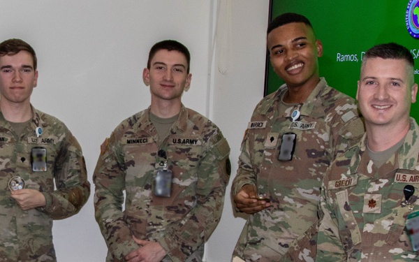 SETAF-AF intelligence analysts receive coins from Michigan National Guard