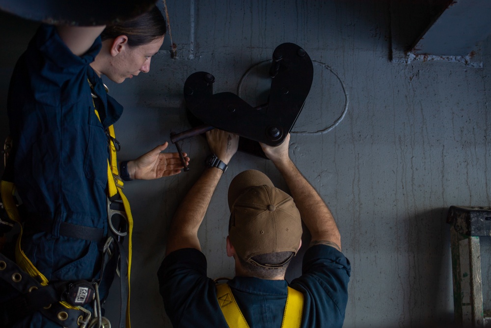 Sailors Install A Beam Clamp