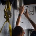 Sailors Install A Beam Clamp