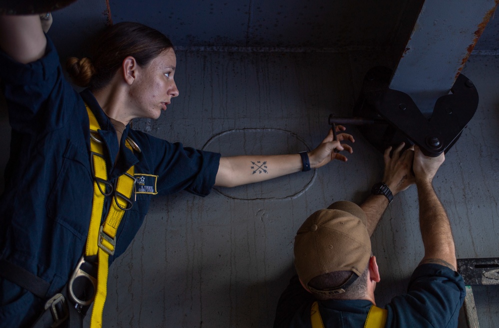 Sailors Install A Beam Clamp