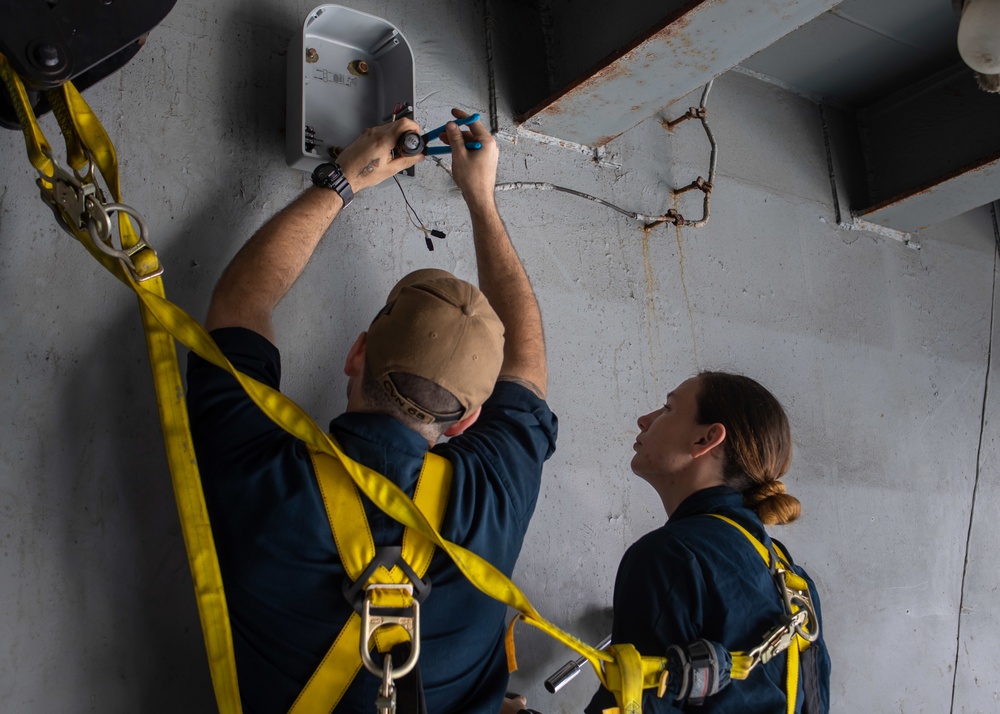 Sailors Install A Beam Clamp