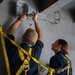 Sailors Install A Beam Clamp