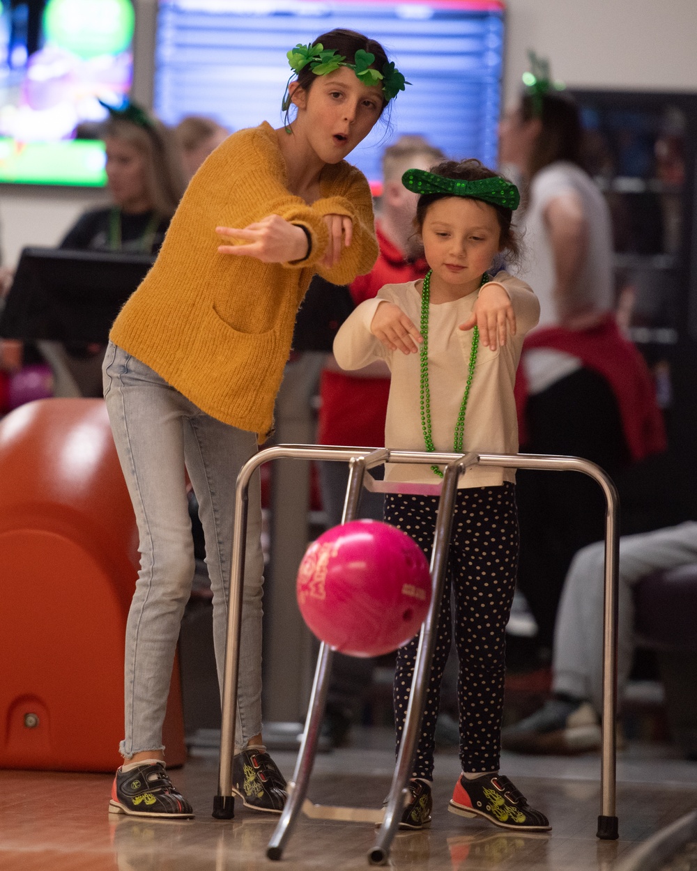 Families enjoy bowling during Hearts Apart