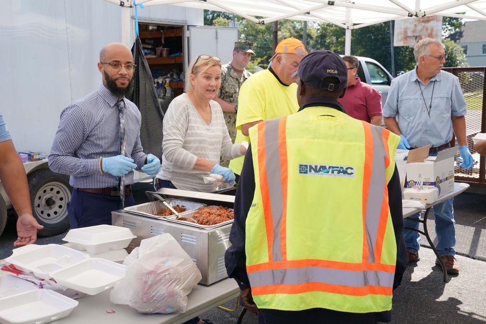 James Thompson Serves Food to Teammates During Employee Appreciation Lunch