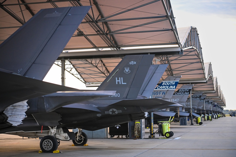 Hill AFB F-35 fighter jets conduct tactical flight operations with SCANG F-16 fighter jets