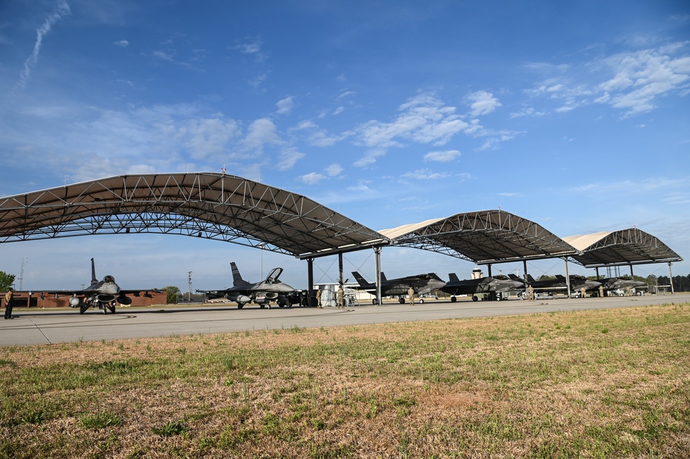 Hill AFB F-35 fighter jets conduct tactical flight operations with SCANG F-16 fighter jets