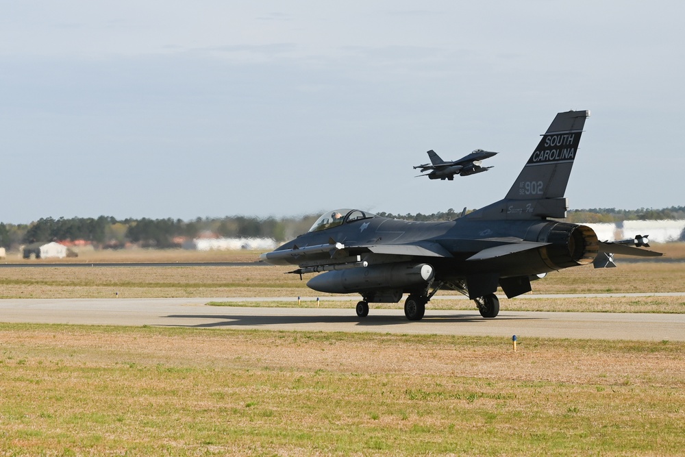 Hill AFB F-35 fighter jets conduct tactical flight operations with SCANG F-16 fighter jets