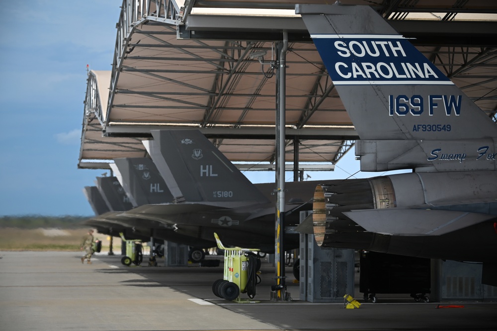 Hill AFB F-35 fighter jets conduct tactical flight operations with SCANG F-16 fighter jets