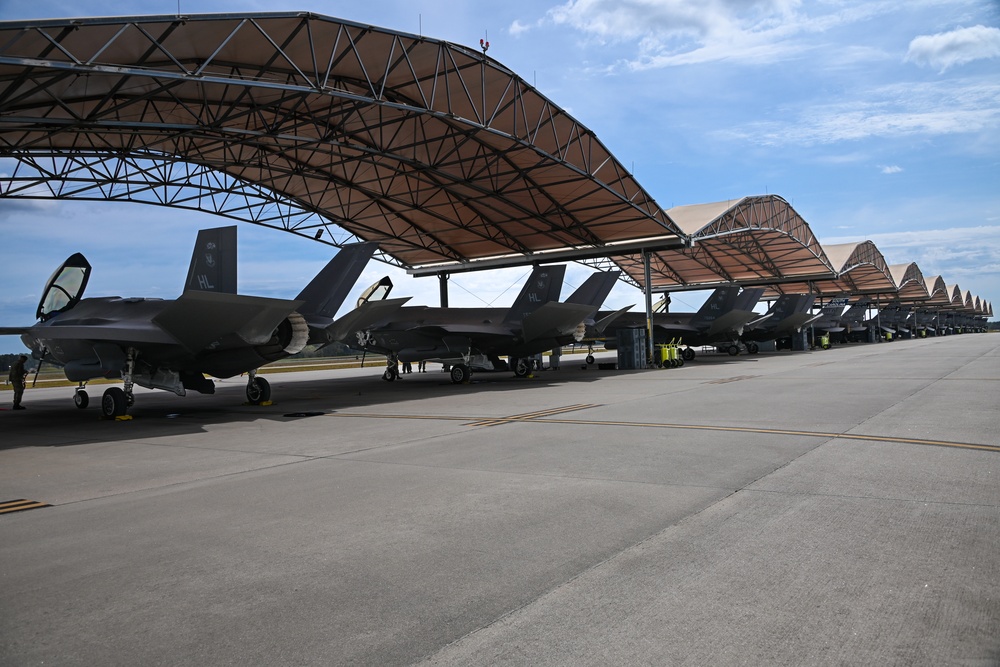 Hill AFB F-35 fighter jets conduct tactical flight operations with SCANG F-16 fighter jets