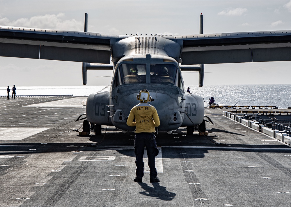 USS Makin Island and USS America working together