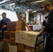 USS OAKLAND CONDUCTS STORE ONLOAD