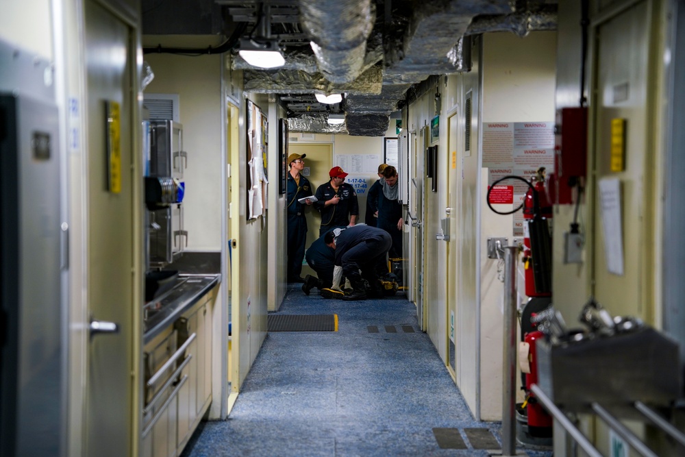 USS OAKLAND CONDUCTS A DAMAGE CONTROL DRILL