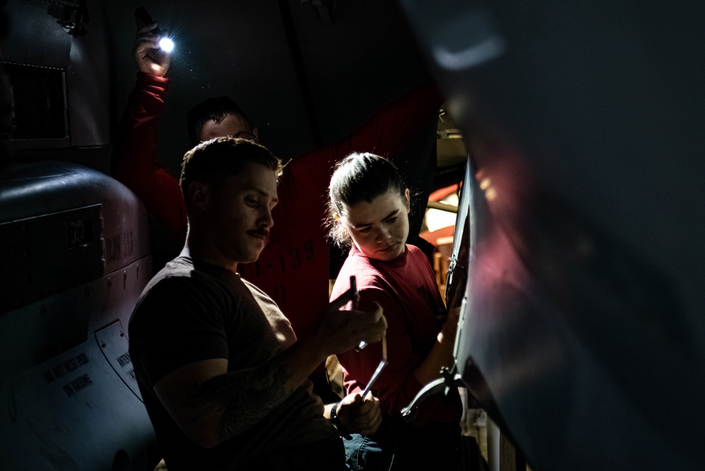 U.S. Navy Sailors Repair Aircraft