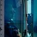 Commanding Officer Observes Cargo Transport During Replenishment At Sea