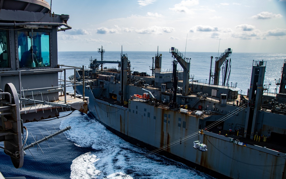 Commanding Officer Observes Cargo Transport During Replenishment At Sea