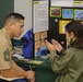 Marines Volunteer to score Science Fair Projects at Maria A. Ulloa Elementary School