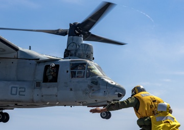 VMM-163 conducts deck landing qualifications aboard the SS Curtiss