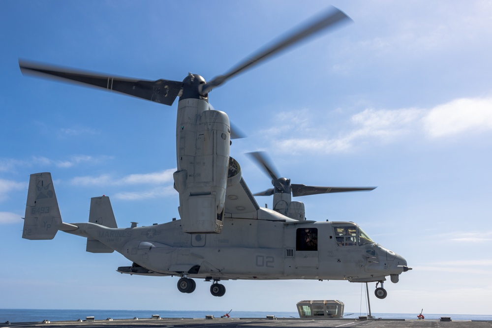 VMM-163 conducts deck landing qualifications aboard the SS Curtiss