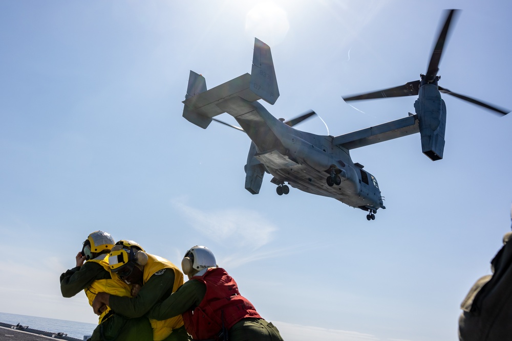 VMM-163 conducts deck landing qualifications aboard the SS Curtiss