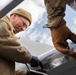 Airmen from the 914th ARW Aircraft Maintenance Squadron working on KC-135's wing lights