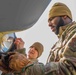 Airmen from the 914th ARW Aircraft Maintenance Squadron working on KC-135's wing lights