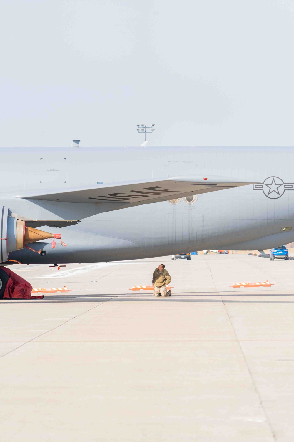 Aircraft Maintainer at the 914th ARW inspects belly of KC-135