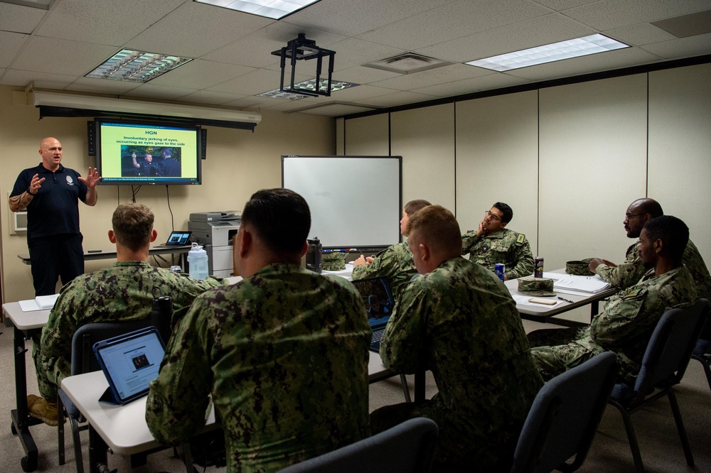 Pacific Missile Range Facility's (PMRF) Navy Security Force Sailors participate in training with Kauai Police Department.