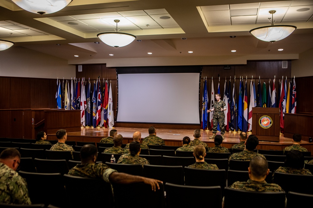 Medical Officer of the Marine Corps Rear Adm. Pamela Miller briefs U.S. Navy corpsmen with Marine Forces Reserve